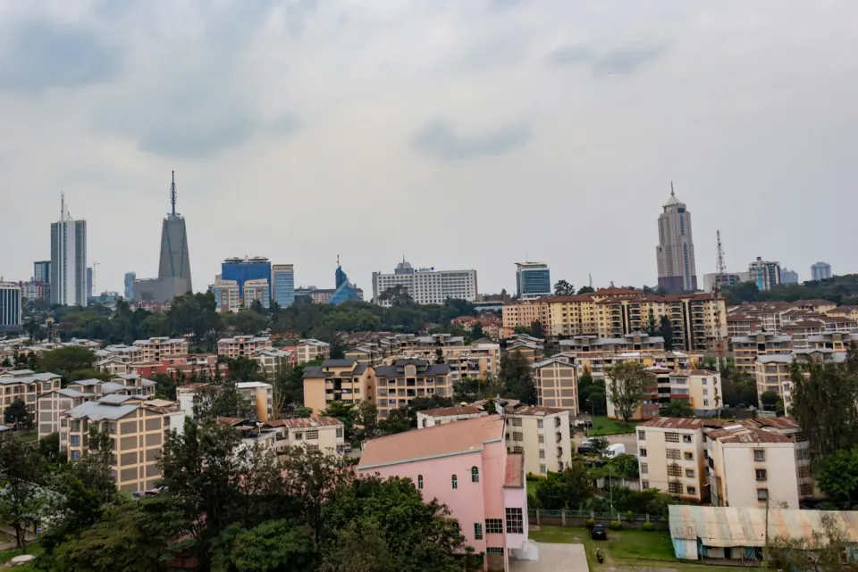 Nairobi skyline with modern towers above residential districts